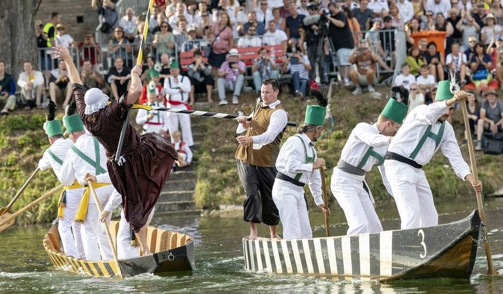 A man falls into the water during the Ulm Jousting tournament
